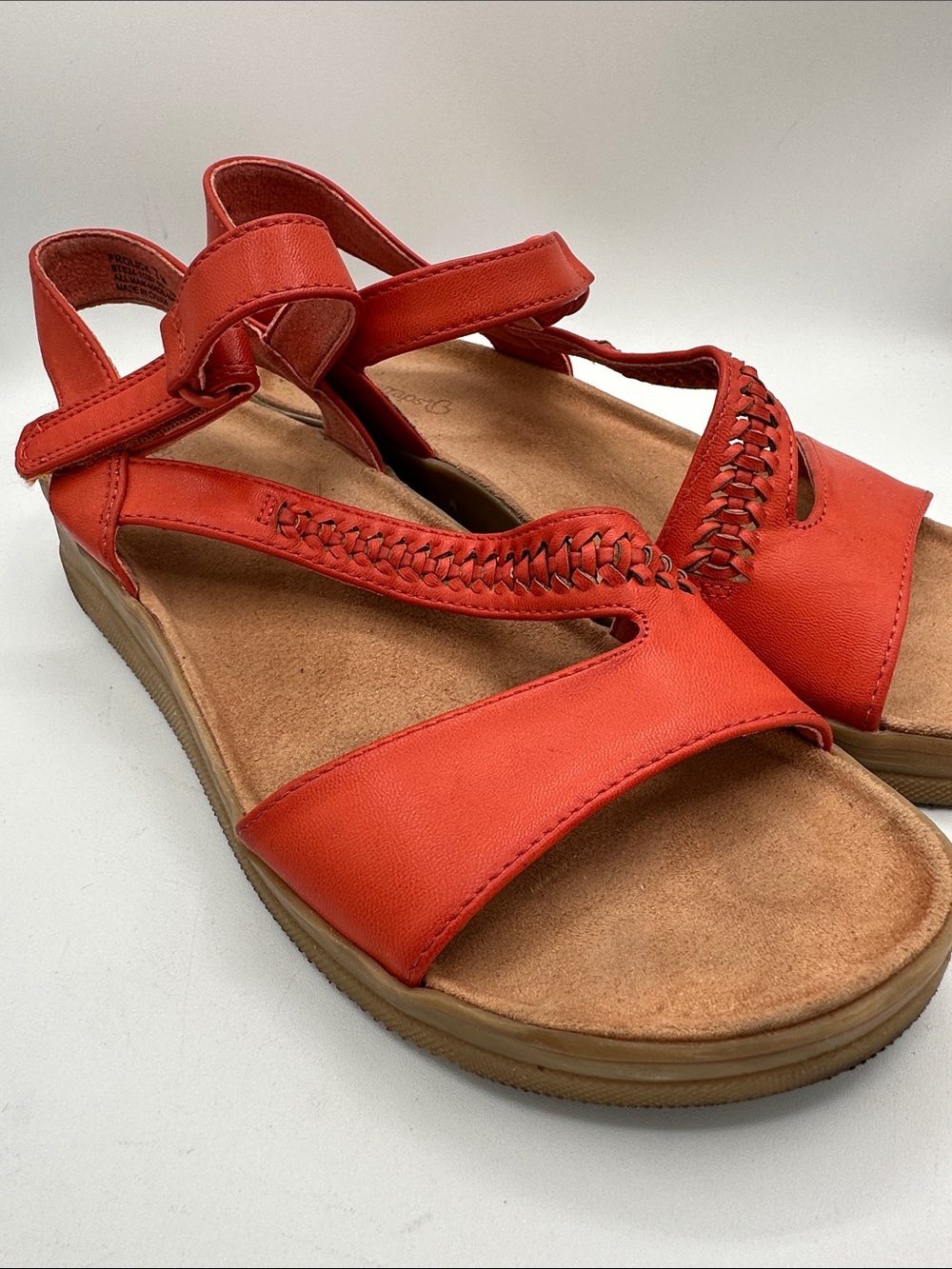 Baretraps burnt orange Frolick asymmetrical wedge sandals, size 7M